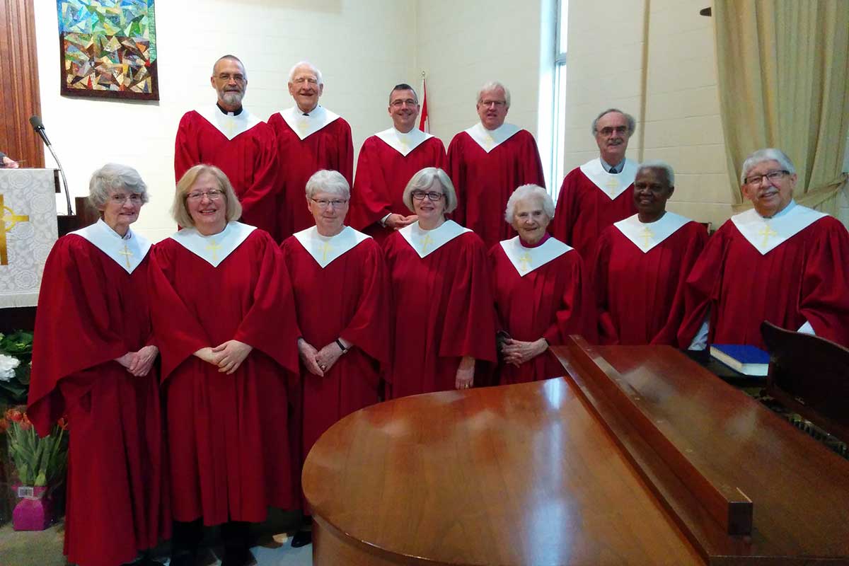 Choir members in red robes