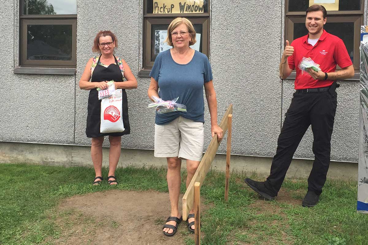 Centre 105 staff members Catherine Stapley, Lorraine Kouwenberg, and Taylor Seguin, pictured at the pick-up window in 2020, appreciate the morale boost from the Cornwall community.
