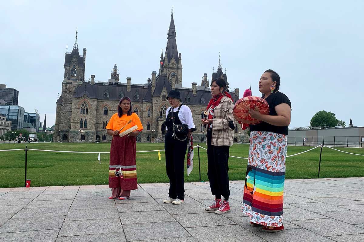 Aboriginal singers in front of the Canadian Parliament