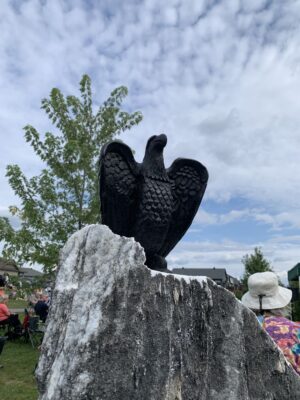 Eagle carving mounted on a stone