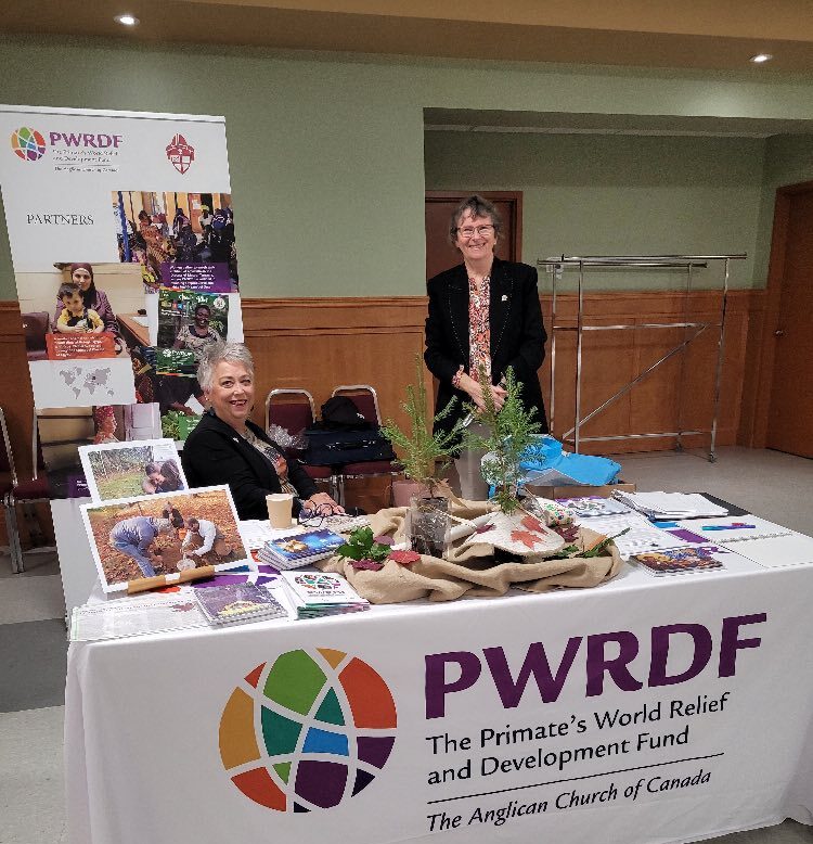 Liana Gallant and Valerie Maier of the Diocesan PWRDF working group at a display table