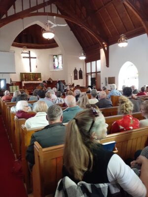 People gathered for a musical concert inside the church