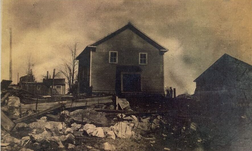 Archival photo of original wooden church