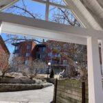 Hollyer House viewed through the Lychgate of Christ Church Bells Corners