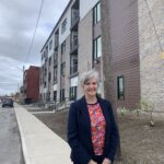 Tammy Mulrooney stands outside the new building