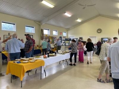 Parishioners and guests enjoyed a wine and cheese celebration in the church hall.