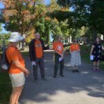 People on the pilgrimage walk in Beechwood Cemetery.