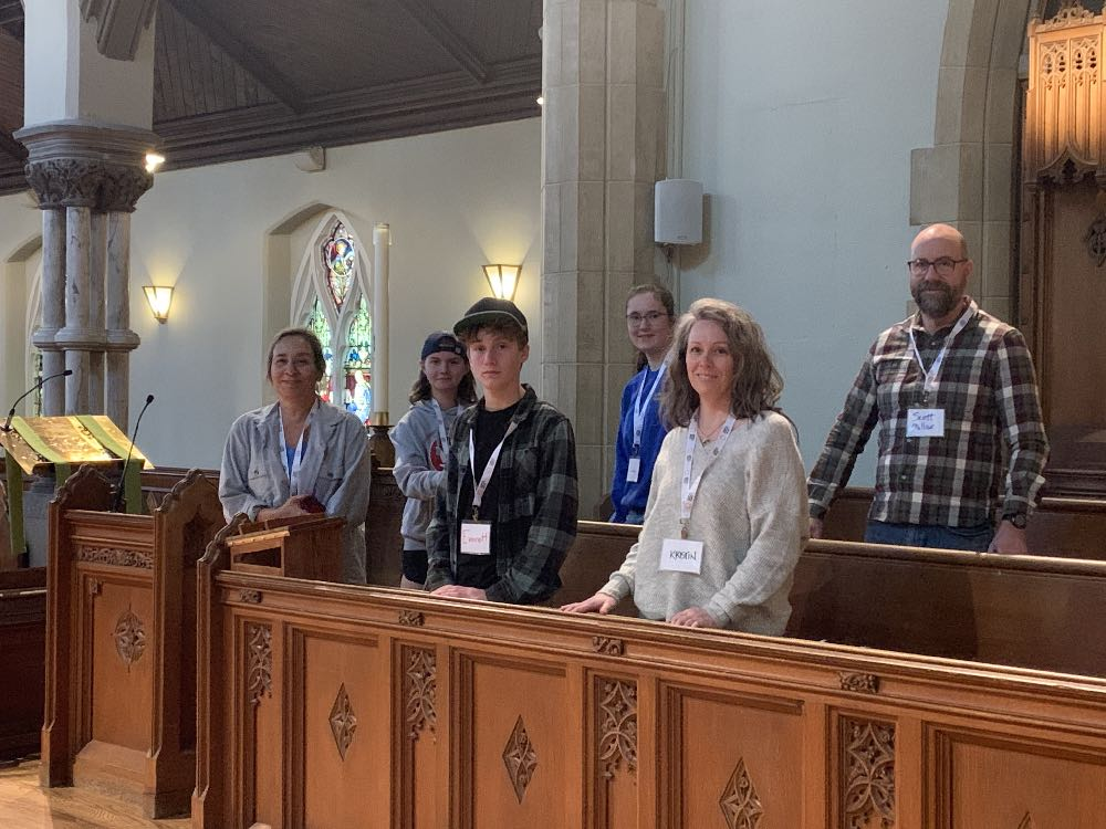 Youth and youth leaders in the choir stalls at the Cathedral.