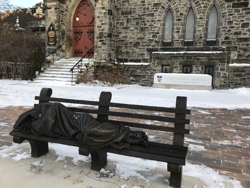 Sculptor Timothy Schmalz's Homeless Jesus in the forecourt of Christ Church Cathedral.