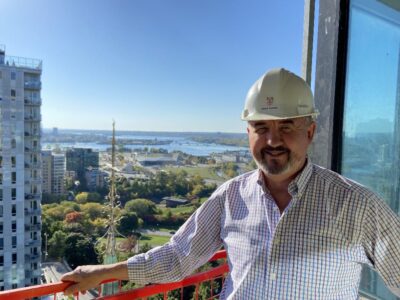 Bishop Shane Parker enjoys the view from the tower while it was still under construction. 