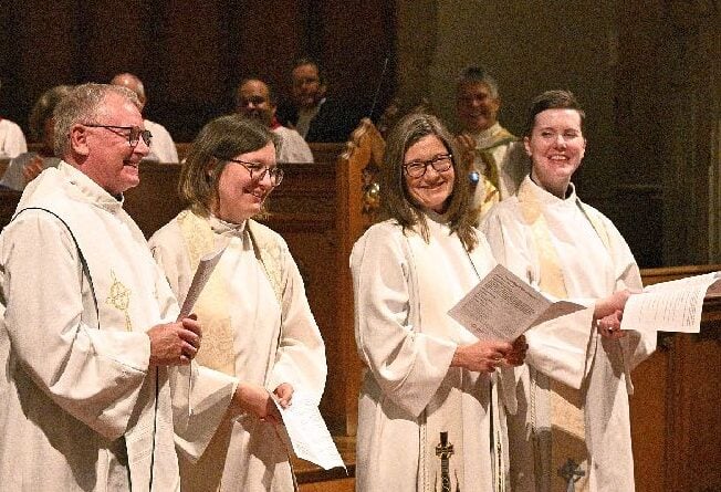 Bishop Shane Parker applauding the Reverends Mark Lewis, Rosemary Parker, Victoria Scott and Alana McCord.