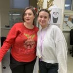 Two women in Christmas attire