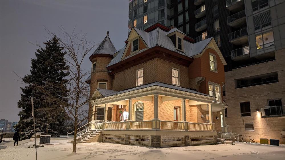 Exterior view of Ascension House on a snowy evening