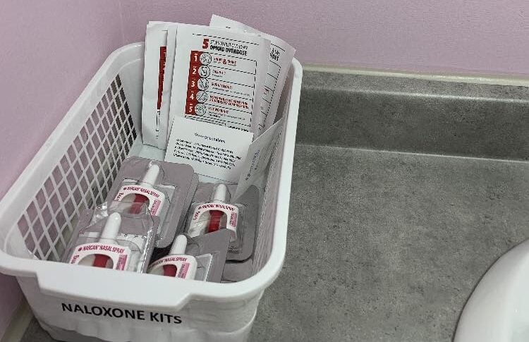 Naloxone kits in a bathroom