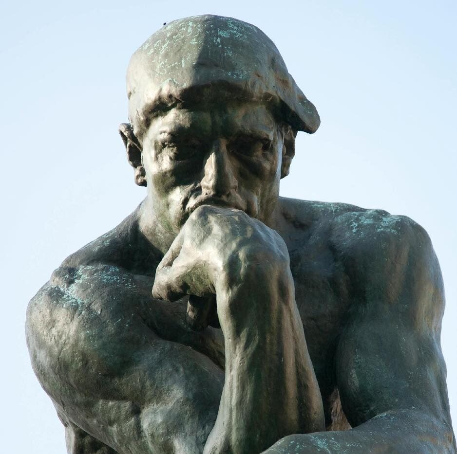 close view of The Thinker statue by August Rodin