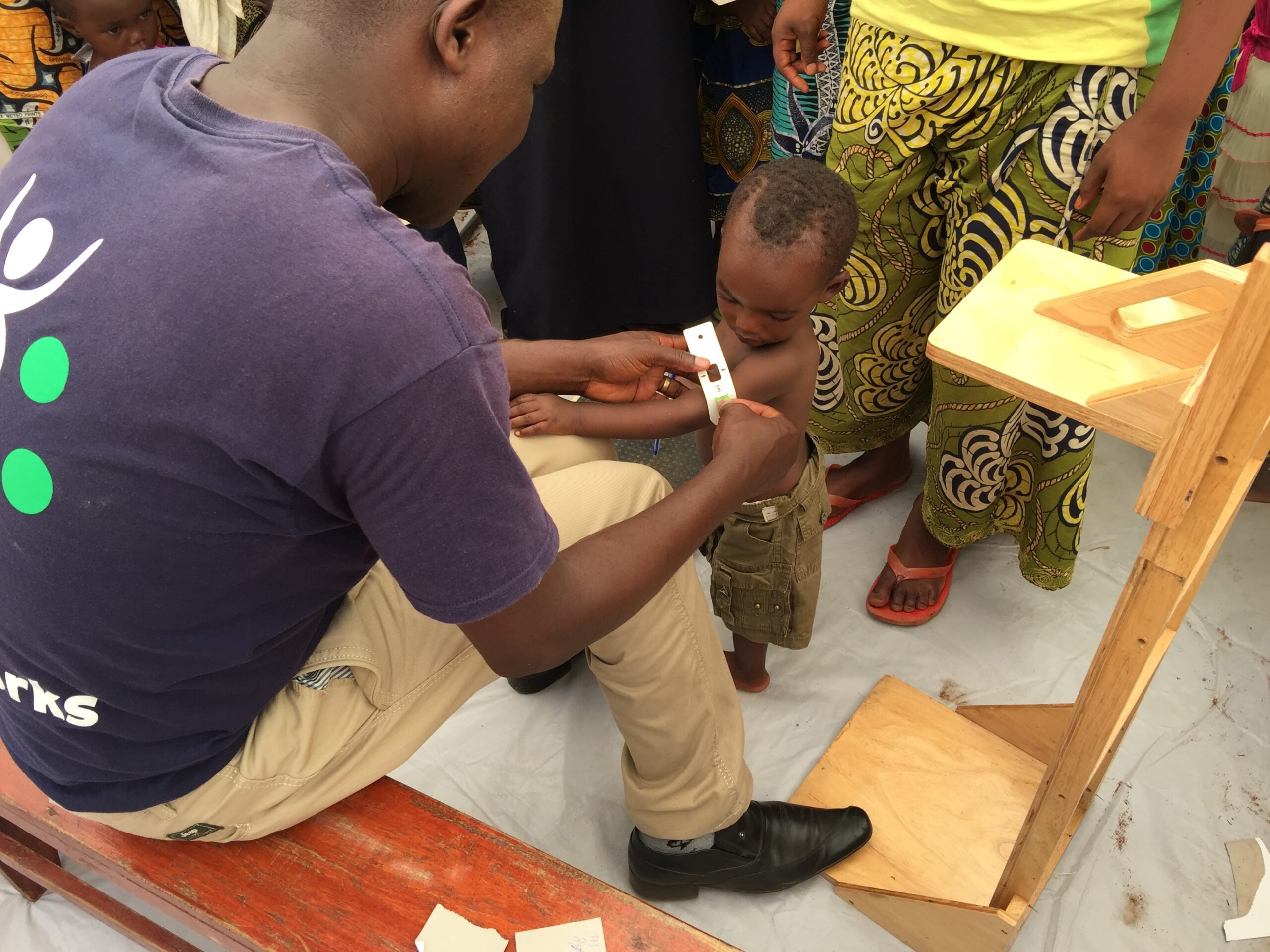 Staff from Village Health Works assess children for malnutrition in rural Burundi in 2017. Alongside Hope has partnered with VHW again, this time to support local production of a Ready to Use Therapeutic Food (RUTF), the supply of which is in jeopardy due to aid cuts.