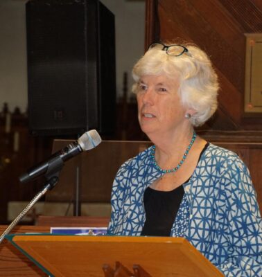 Debbie Grisdale at the mic.