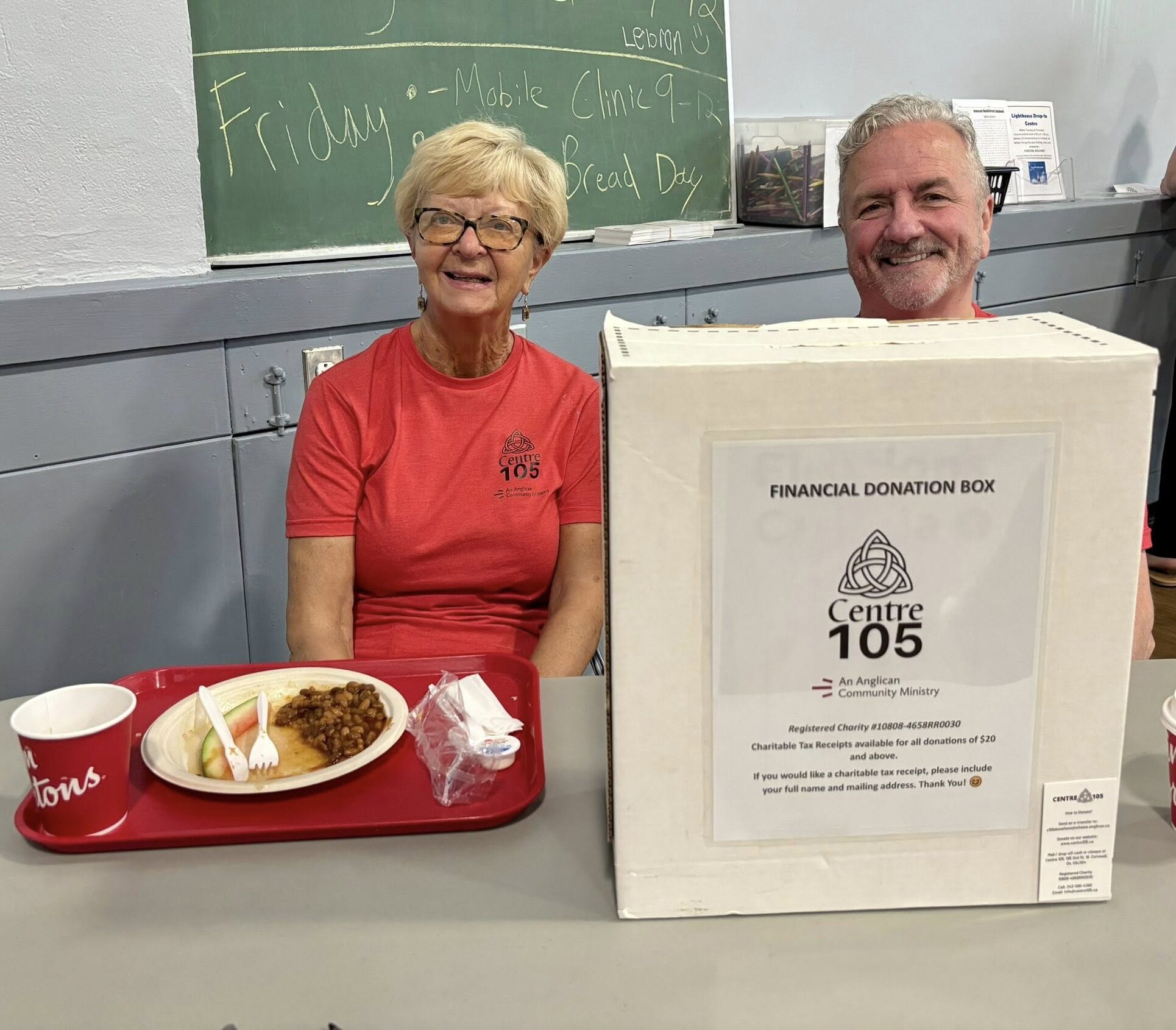 Centre 105 board members welcome people to fundraising breakfast