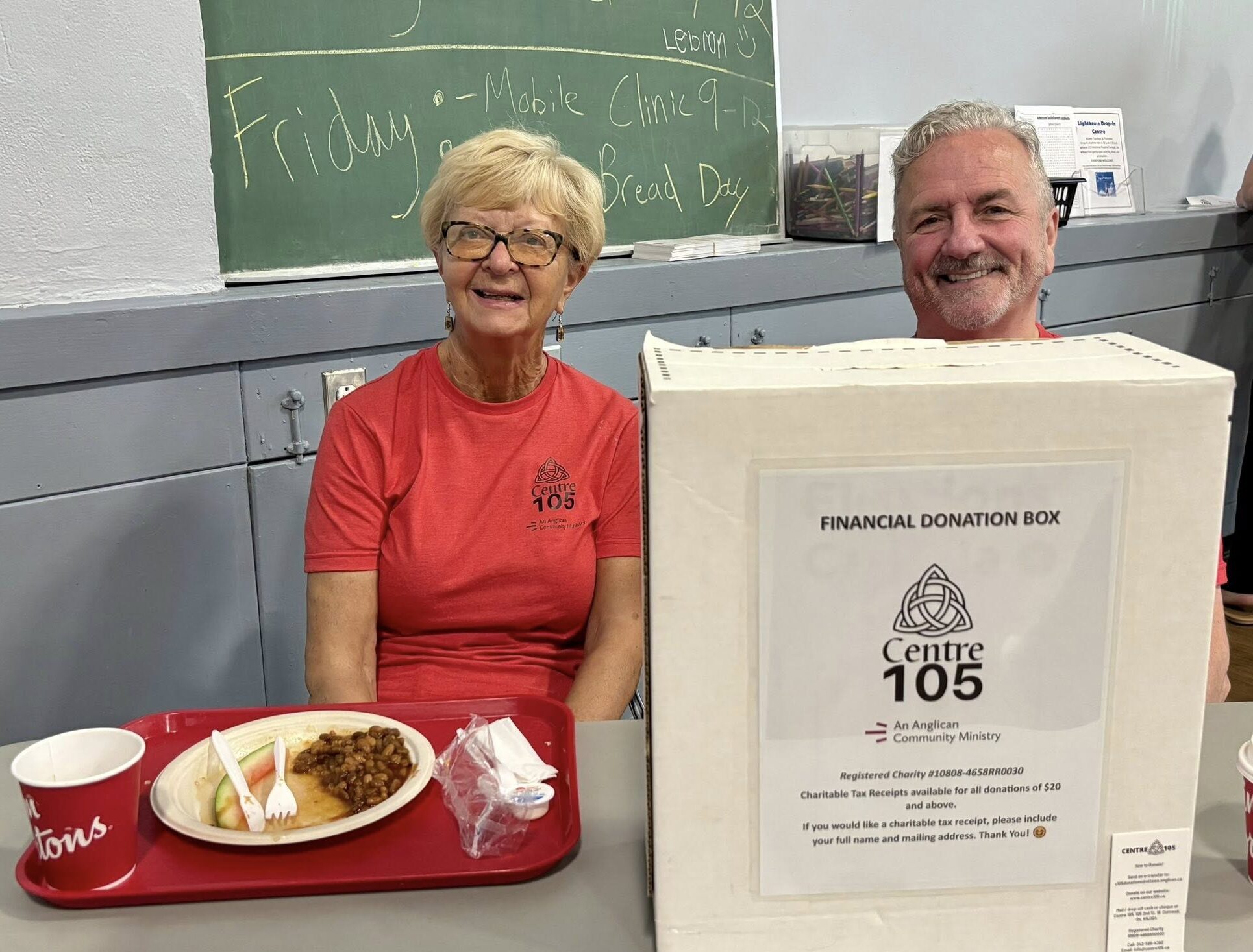 Centre 105 board members welcome people to fundraising breakfast