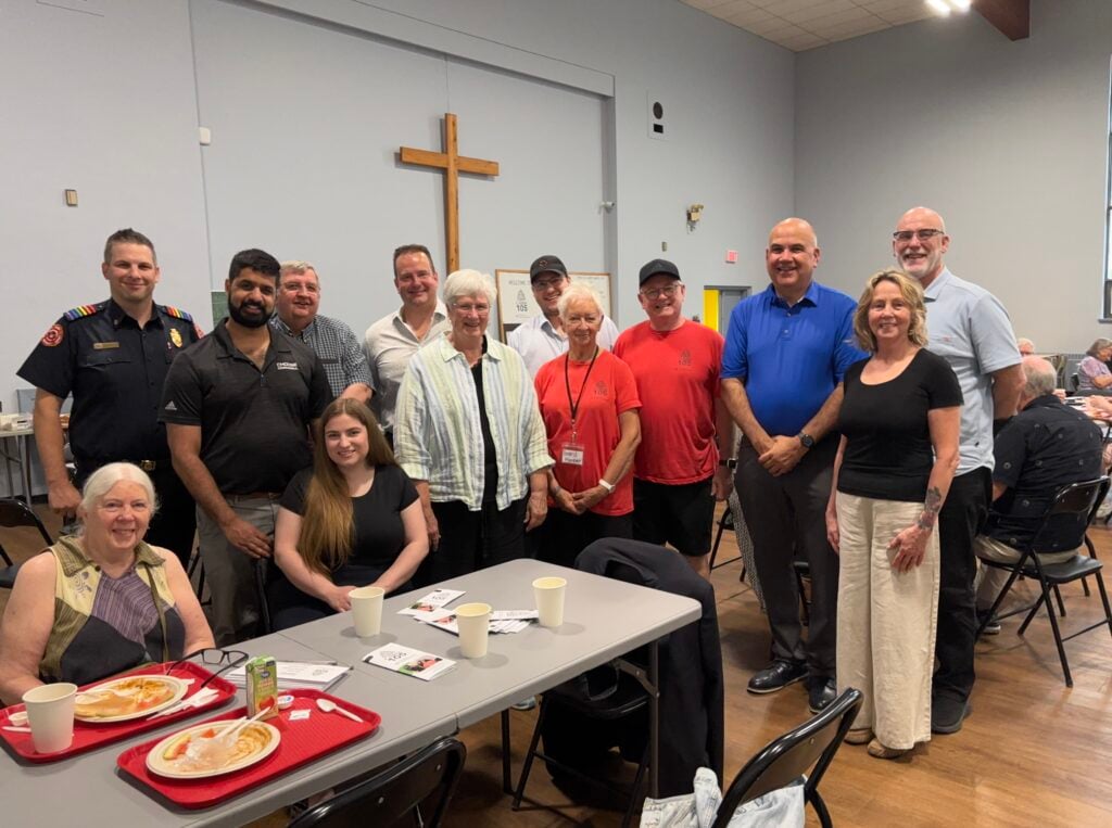 People gathered for a photo at the fundraiser