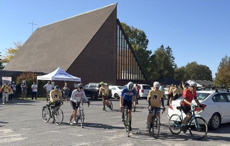 Cyclists set off on the ride from the parking lot of St. Aidan's Anglican Church