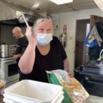Marie Beaudet has some fun in the kitchen while preparing one of Centre 440's delicious meals.