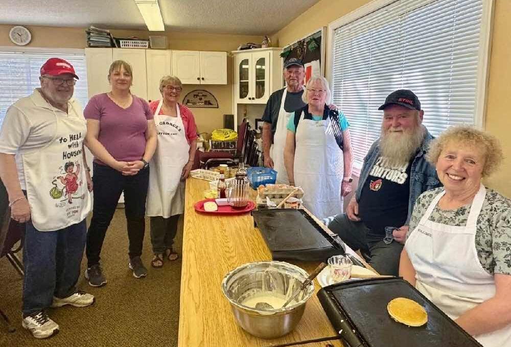 St. George's team ready to serve. ( L to R) Wayne Munro, Alison Wark, Kathy Lowe, Gary and Christine Anderson, Al Sonnenburg, and Debbie McMahon.