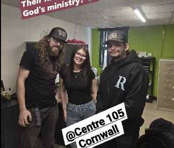 Two Strong Christian Boys pose with Centre 105's Melodie Cousineau for a social media post.