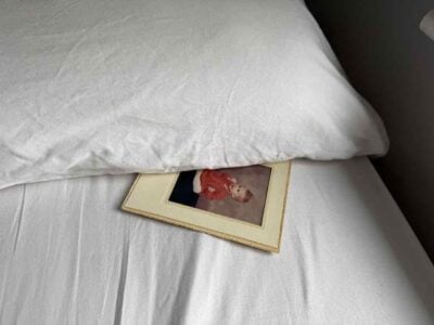 Baby photo tucked under a pillow
