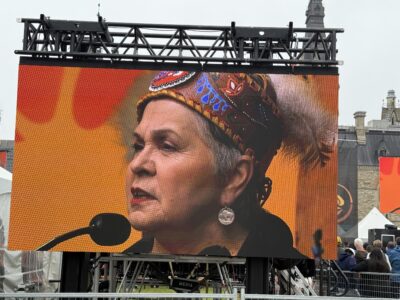 Algonquin Elder Claudette Commanda's image on the big screen on Parliament Hill on Sept. 30, 2026. Photo: LA Williams