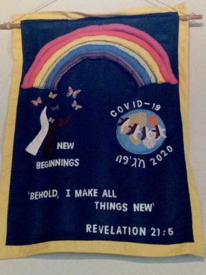 Banner marking COVID-19 noting Revelation 21:5